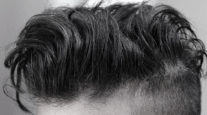 High fade on dark brown straight hair.